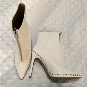 White heel booties with silver studs